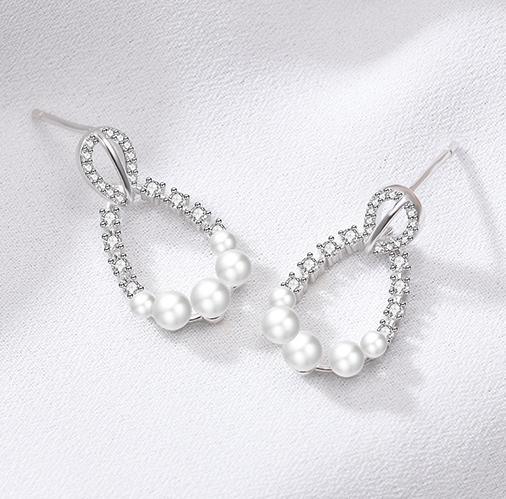 Boucles d'oreilles élégantes pour femmes en argent sterling 925 avec perle de moissanite